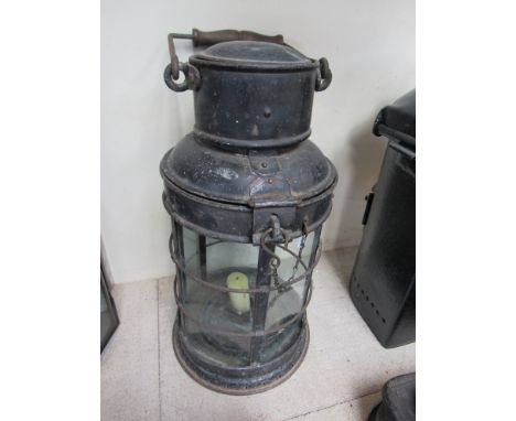 A black painted general purpose candle hand lamp with five clear aspects