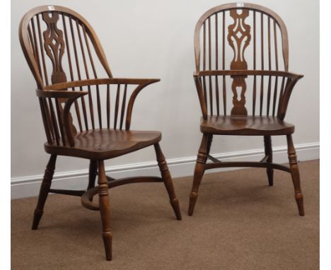 Pair 20th century high back Windsor armchairs, stick and pieced splat backs, turned supports connected by crinoline stretcher