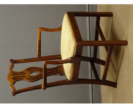 Chippendale style mahogany elbow chair, cresting rail above fret work splat, upholstered drop in seat Condition Report Click 