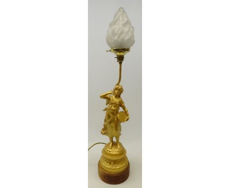 Art Nouveau style gilt painted spelter figural table lamp of a female tambourine player with glass flambe shade and turned ha