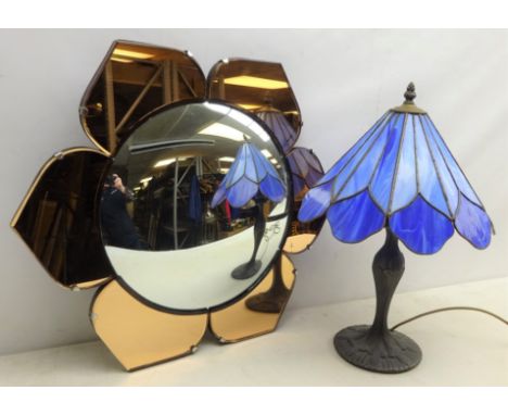 Tiffany style table lamp with flower shaped shade and moulded base, H50cm and a vintage flower head shaped mirror with amber 