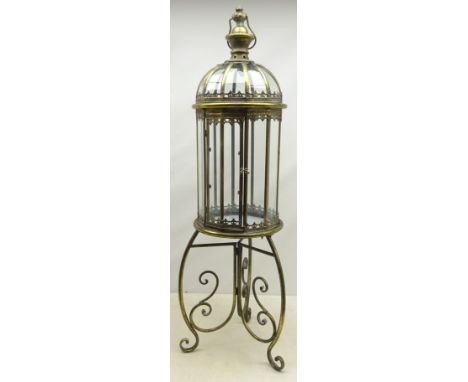 Bronzed finish circular lantern with carrying handle on stand, D34cm, H115cm Condition Report Click here for further images, 