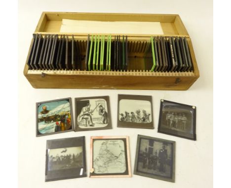 Victorian and later Magic lantern slides including some Military, Cartoons, Towns, family groups etc in case 