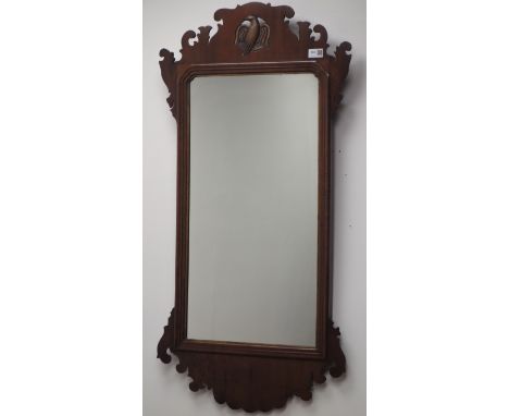 Early 20th century Chippendale style wall mirror, fret work framed with carved and gilt eagle pediment, 53cm x 105cm Conditio