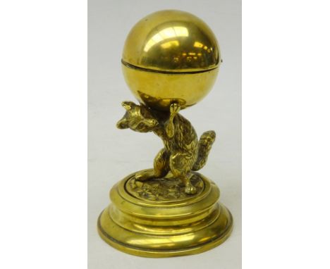 19th/ early 20th century brass inkwell depicting a Fox carrying globe on naturalistic base and circular plinth, H13cm Conditi