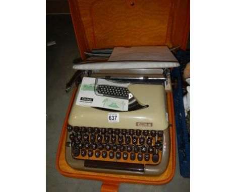 A Danish Erika typewriter in case with cover, instructions etc.&nbsp;COLLECT ONLY