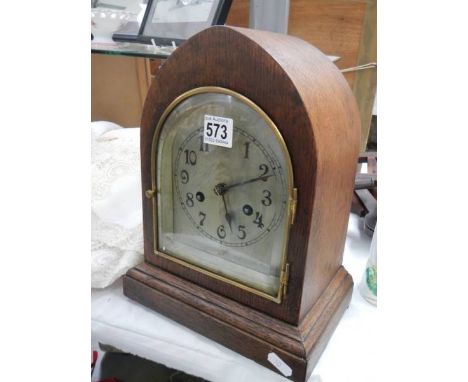A good eight day mantel clock with silvered dial, in working order.&nbsp;COLLECT ONLY