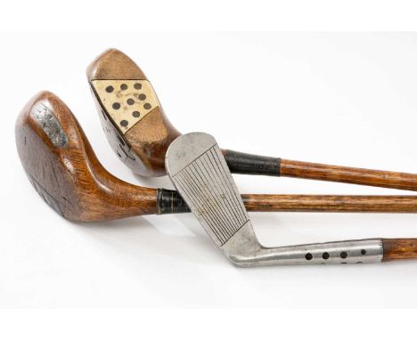 THE GOLF CLUB HOUSE: THREE HICKORY SHAFTED CLUBS, first bearing the name D. Anderson & Sons, St Andrews (Elite), with a leath