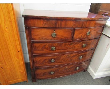 A Victorian mahogany bow front chest of two short over three long drawers, flame front, bracket feet, 107cm x 106cm x 53cm