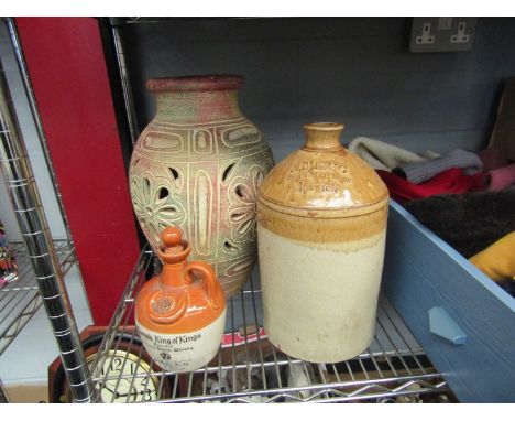 A decorative pottery urn, an A. Blogg spirit keg and a small Munro's Scotch Whisky jug