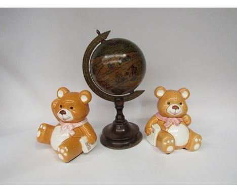 An antique style globe, 13cm diameter and a pair of ceramic teddy bear book-ends