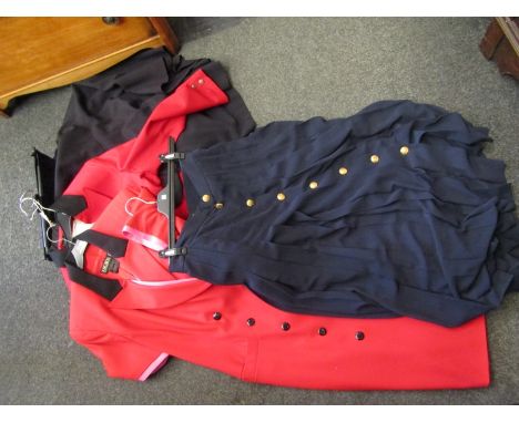 Three pieces of Louis Féraud clothing including two navy skirts and a scarlet red jacket, an Escada military style red dress 