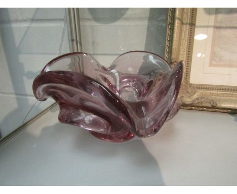 A heavy amethyst glass splash bowl