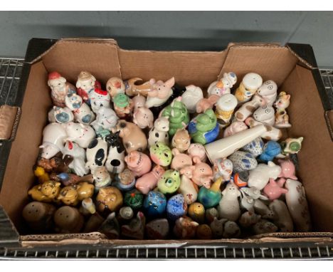 A box of mixed ceramic salts and pepperettes