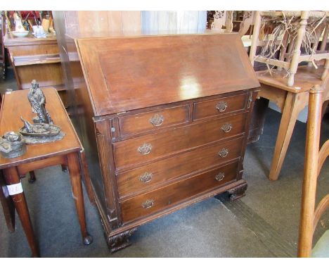 A late Victorian mahogany bureau with two over three drawers, carved bracket feet, fitted ornate interior, 109cm high x 102cm