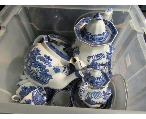 Two boxes of various ceramics and glassware including ruby, cranberry and Willow pattern teaware
