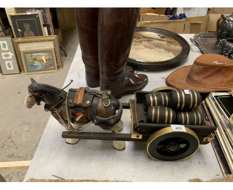 A CERAMIC HORSE FIGURE WITH WOODEN CART AND BARRELS 