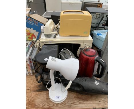 A COLLECTION OF ELECTRICAL ITEMS TO INCLUDE A MICROWAVE, TOASTER, KETTLE, LAMP, ELECTRIC KNIFE ETC IN WORKING ORDER 