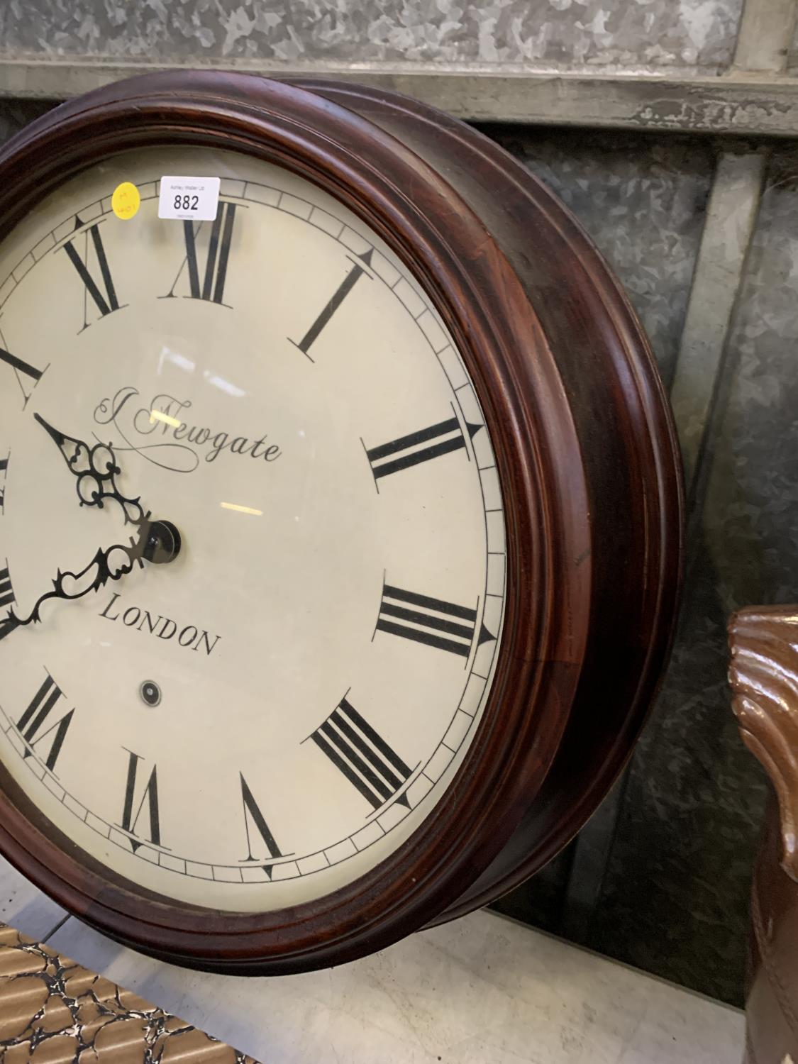 A LARGE WOODEN FRAMED NEWGATE LONDON WALL CLOCK