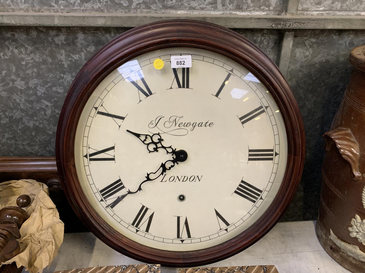 A LARGE WOODEN FRAMED NEWGATE LONDON WALL CLOCK