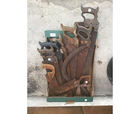 VARIOUS VINTAGE SAWS AND A SCYTHE 