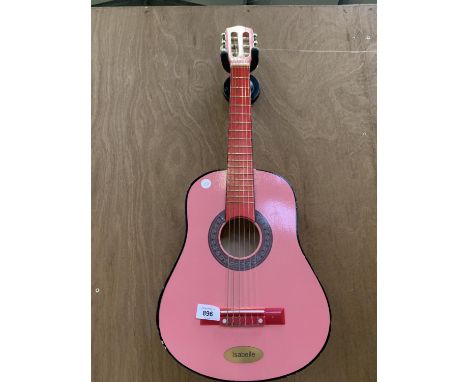 A SMALL CHILD'S PINK ACOUSTIC GUITAR 