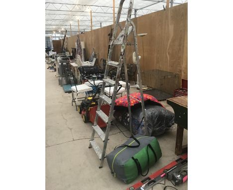 A FREEDOM TRAIL SENDERO 6 TENT AND A PAIR OF ALLOY SIX RUNG STEP LADDERS 