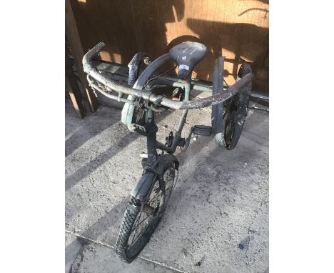 A VINTAGE TRICYCLE 