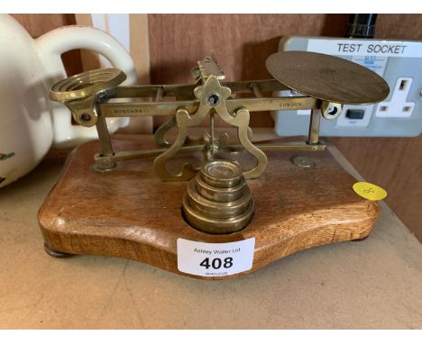 A VINTAGE SET OF MORDANA AND CO, LONDON SET OF POSTAL SCALES 