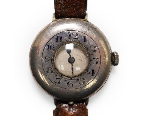 A gentleman's mid 1920's silver Rolex half hunter manual wind wrist watch, with enamelled Arabic chapter ring and dial, signe