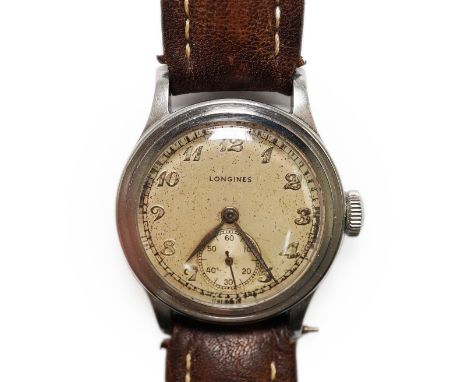 A gentleman's mid 1940's steel Longines military manual wind wrist watch, with Arabic dial and subsidiary seconds, the case b