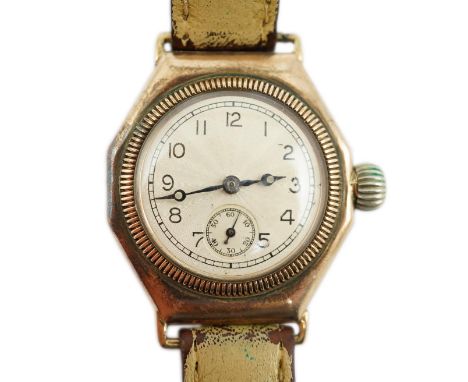 A late 1920's 9ct gold boy's size Rolex manual wind wrist watch, with Arabic dial and subsidiary seconds, with Rolex Prima mo