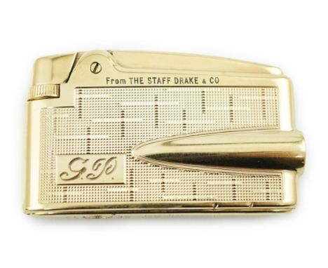 A 9ct gold cased Ronson lighter, with engraved initials and inscription, 61mm.  Light surface scratches in places. Does not c