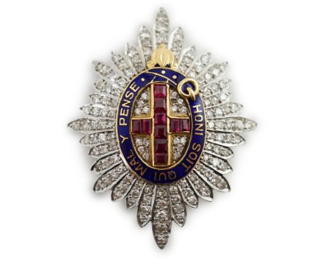 An 18ct gold, platinum, diamond, enamel and ruby Order of the Garter brooch, 40mm, gross weight 11.1 grams.  Some minor damag