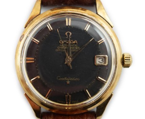 A gentleman's 1960's stainless steel and gold plated Omega Automatic Chronometer Constellation 'pie pan' black dial wrist wat