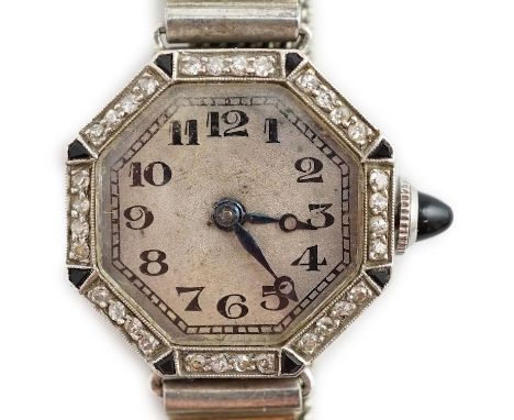 A lady's 1940's? 18ct gold, black onyx and diamond set Glycine Watch Co manual wind octagonal cocktail watch, on an 18ct whit