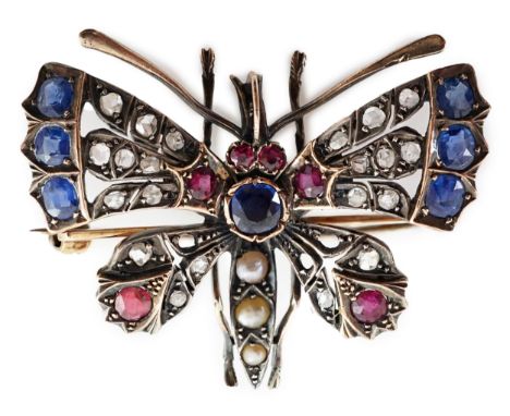 A Victorian gold, diamond, sapphire, ruby and split pearl cluster set butterfly brooch, width 42mm, gross weight 14.7 grams. 