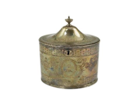 A George III silver oval tea caddy by Hester Bateman, with engraved decoration and armorial and turned finial, London, 1789, 