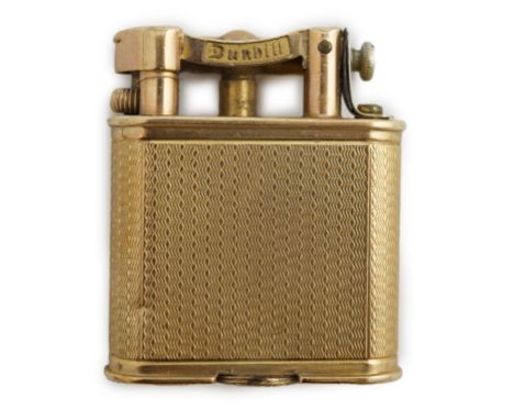 A George V engine turned 9ct gold cased Dunhill lighter, hallmarked for London, 1929, 43mm.  Mechanism not working. Two small