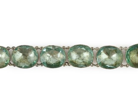 A rare 18th century 'Queen Anne' silvered metal and foil backed aquamarine paste necklace, set with thirteen oval facet cut s