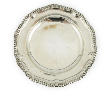 A Victorian silver dinner plate, by John Samuel Hunt, with gadrooned border, London, 1853, 25.5cm, 19.3oz.  Surface scratches