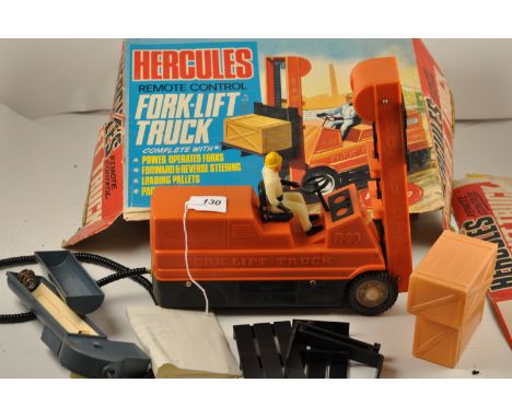 VINTAGE (1966) EMPIRE MADE HERCULES REMOTE CONTROL FORK LIFT TRUCK WITH INSTRUCTIONS AND SHABBY BOX