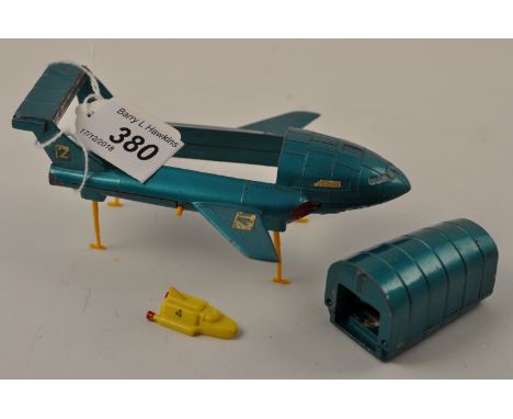 DINKY TOYS 101 THUNDERBIRD 2 WITH LEGS AND SMALL VEHICLE