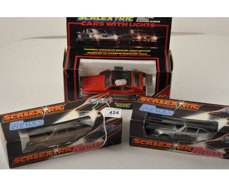 3 SCALEXTRIC CARS WITH LIGHTS TO INCLUDE C288 PORSCHE SILVER, C287 FORD ESCORT AND C300 CAPRI BOXED