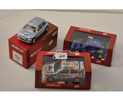 3 NINCO SCALEXTRIC RACING CARS TO INCLUDE 50165 TOYOTA COROLLA CASTROL NO5 SAINZ, 50103 RENAULT CLIO 16V RALLY (PLATA) AND RE