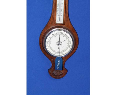 OAK CASED ANEROID BAROMETER AND THERMOMETER