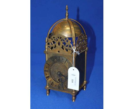 BRASS LANTERN CLOCK
unsigned 8 day movement, the brass dial with Roman numerals, pierced steel hands, set within a brass case