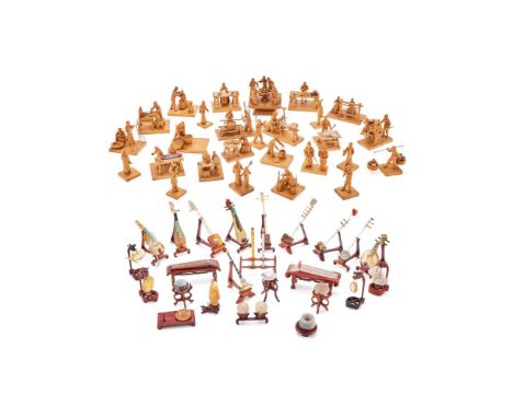 A group of twenty-seven Chinese boxwood carvings of street traders and figures, 20th century, including: musicians, dressmake