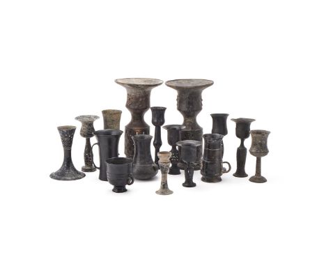 A group of Longshan black pottery Neolithic vessels, circa 2500-2000 BC and later, the burnished black thinly potted bodies v