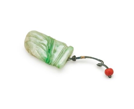 Y A Chinese jadeite pendant in the form of a Qin musical instrument, 19th century, and in tones of green and carved with sash